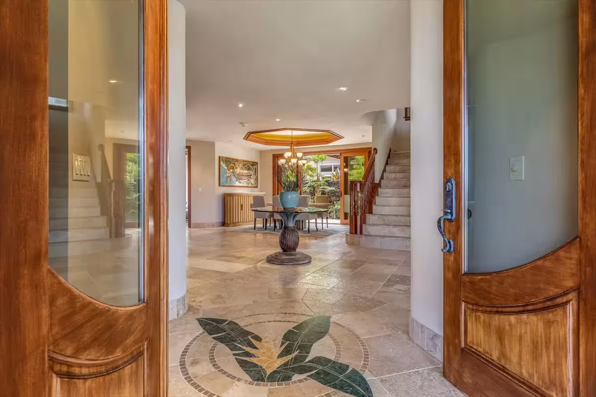 Shining Seas — gated Kailua-Kona estate framed by palms