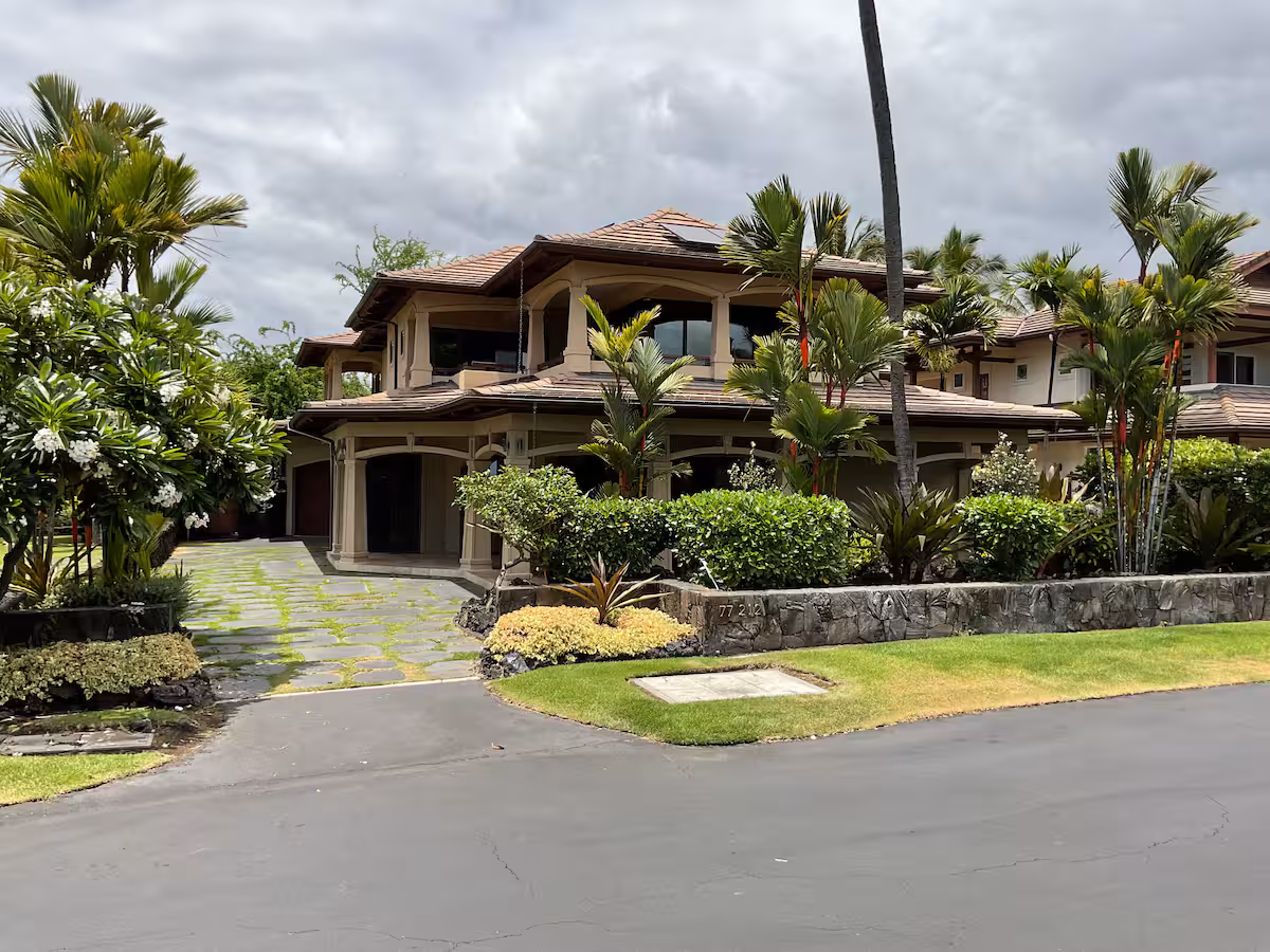 Shining Seas — gated Kailua-Kona estate framed by palms