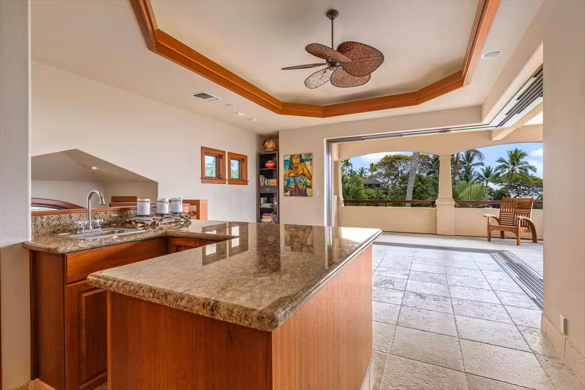 Shining Seas — gated Kailua-Kona estate framed by palms