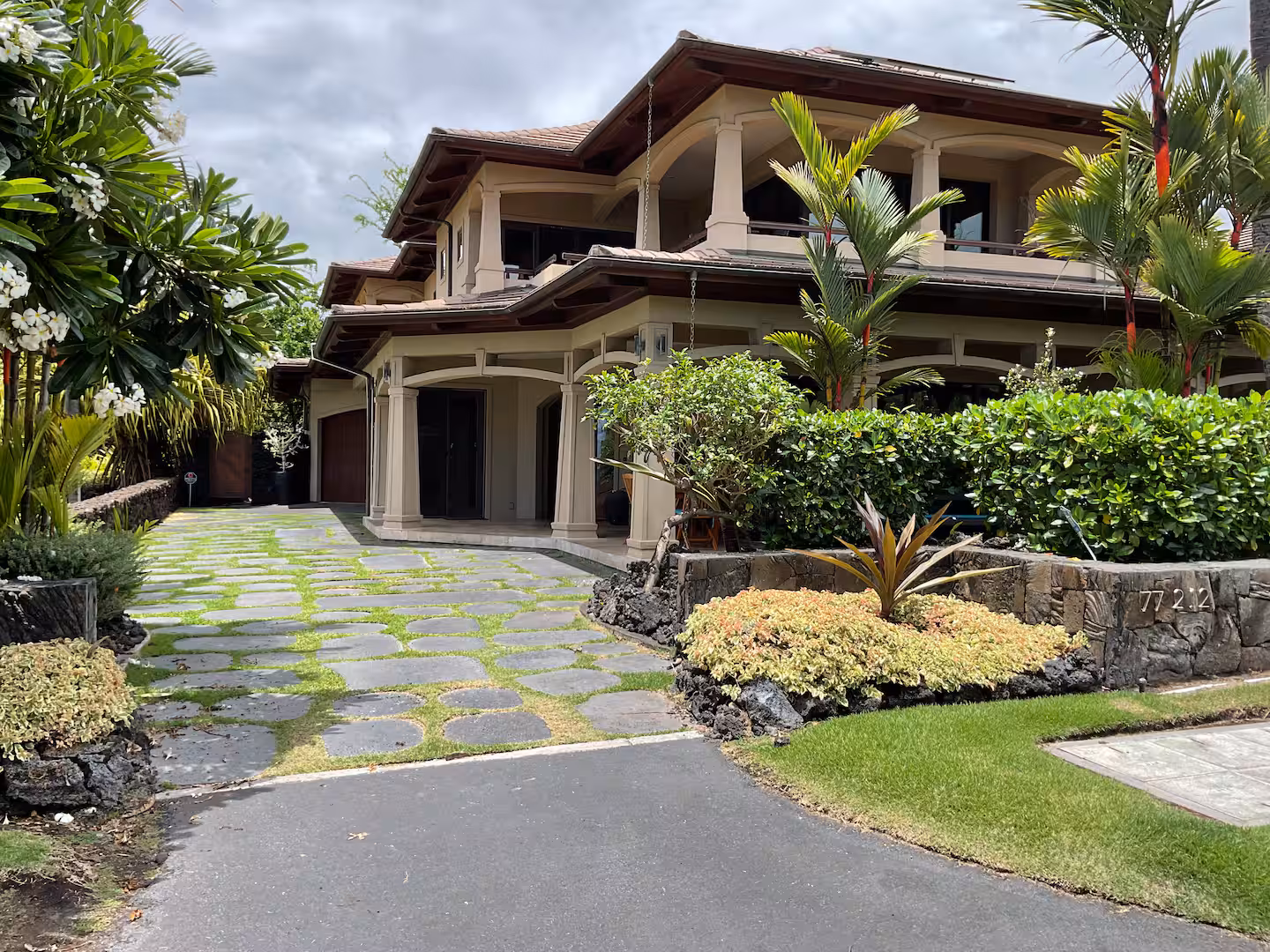 Shining Seas — gated Kailua-Kona estate framed by palms