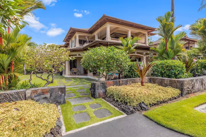 Shining Seas — gated Kailua-Kona estate framed by palms