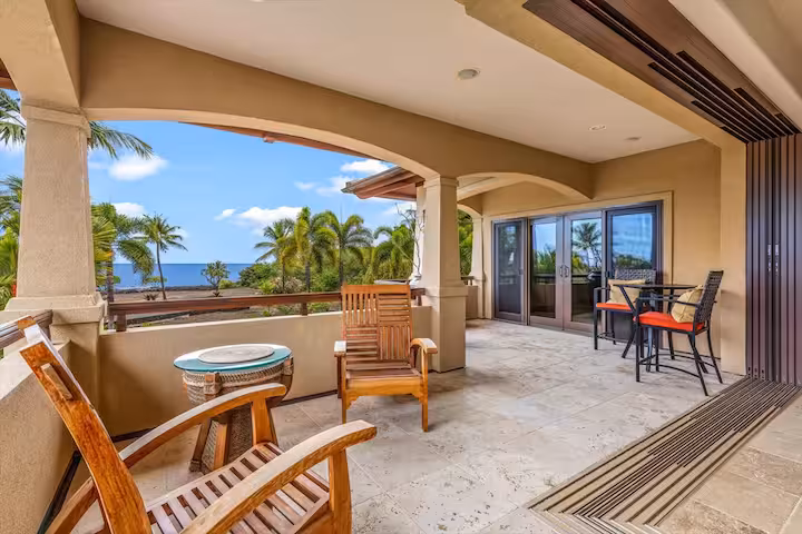 Shining Seas — gated Kailua-Kona estate framed by palms