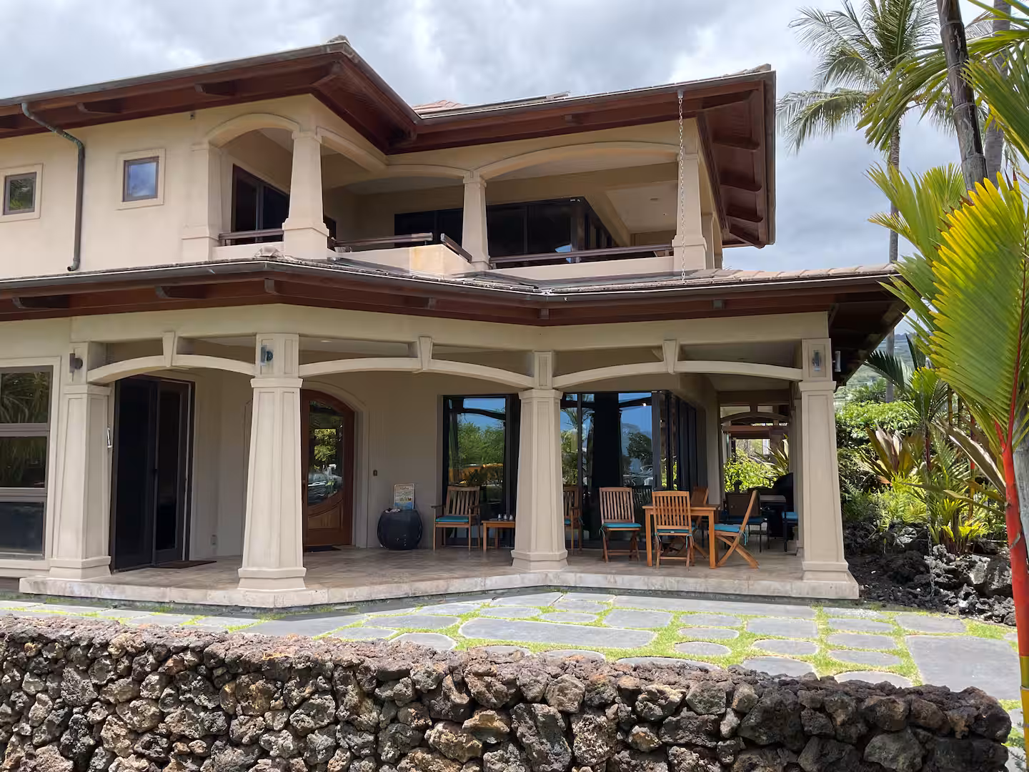 Shining Seas — gated Kailua-Kona estate framed by palms